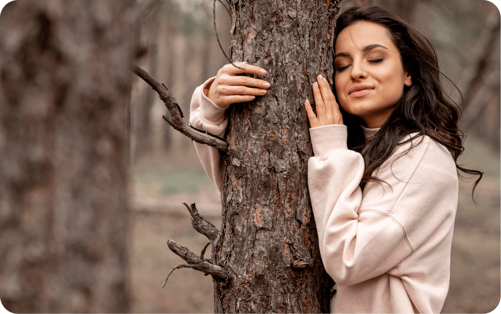 Person hugging tree