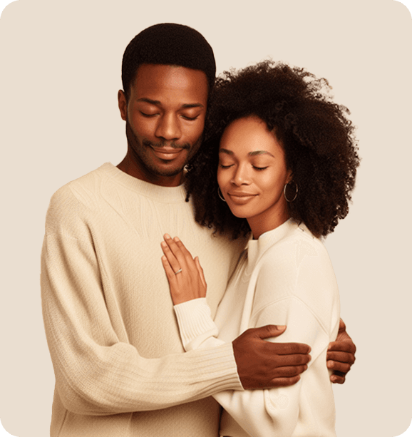 Young couple in a neutral, comfortable setting, representing trust and comfort in sexual wellness healthcare
